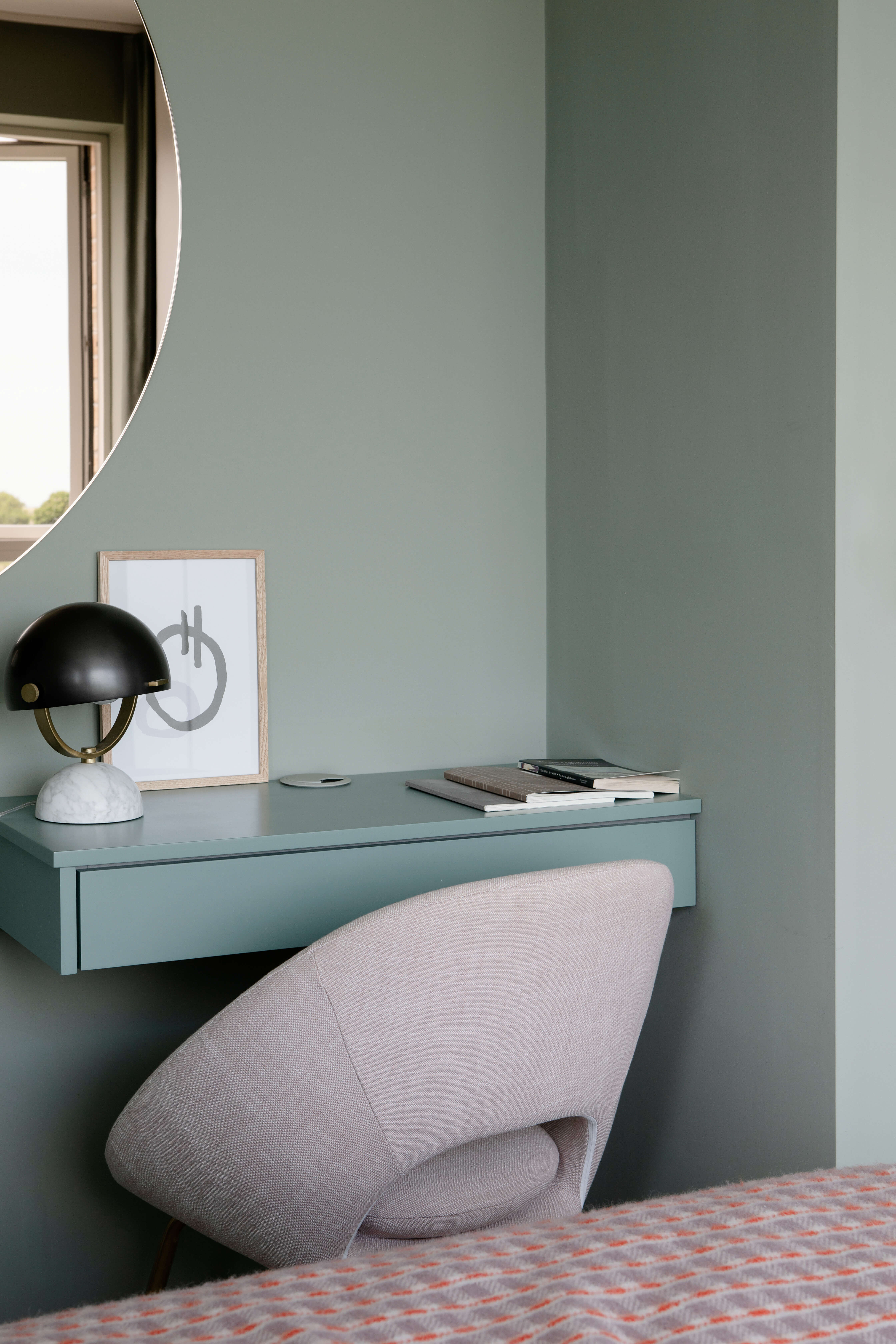 Create a dressing area in a bedroom with bespoke joinery